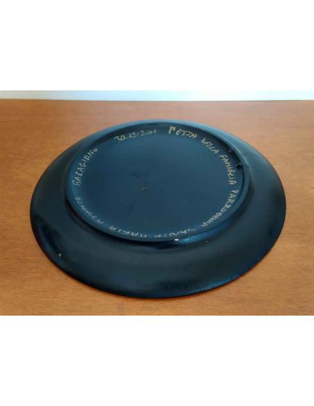Piatto in Ceramica Decorativo Nero con Dipinto Floreale Artigianale, vista parte inferiore.