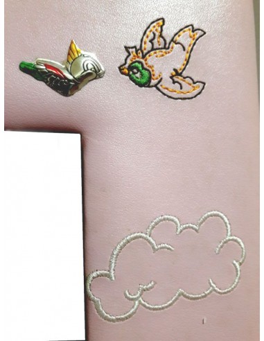 Applicazione uccellino in argento