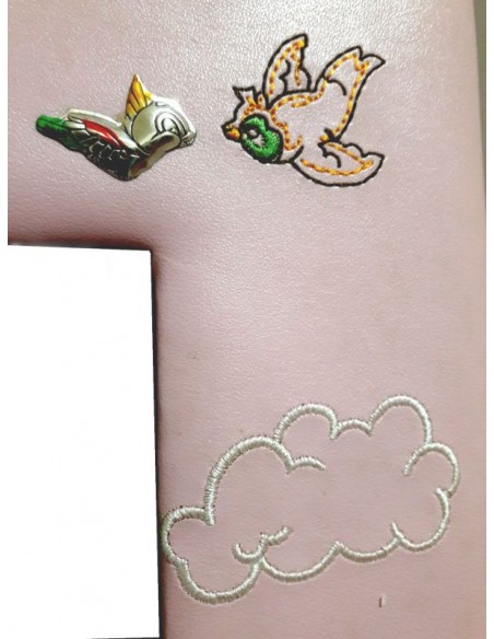 Applicazione uccellino in argento